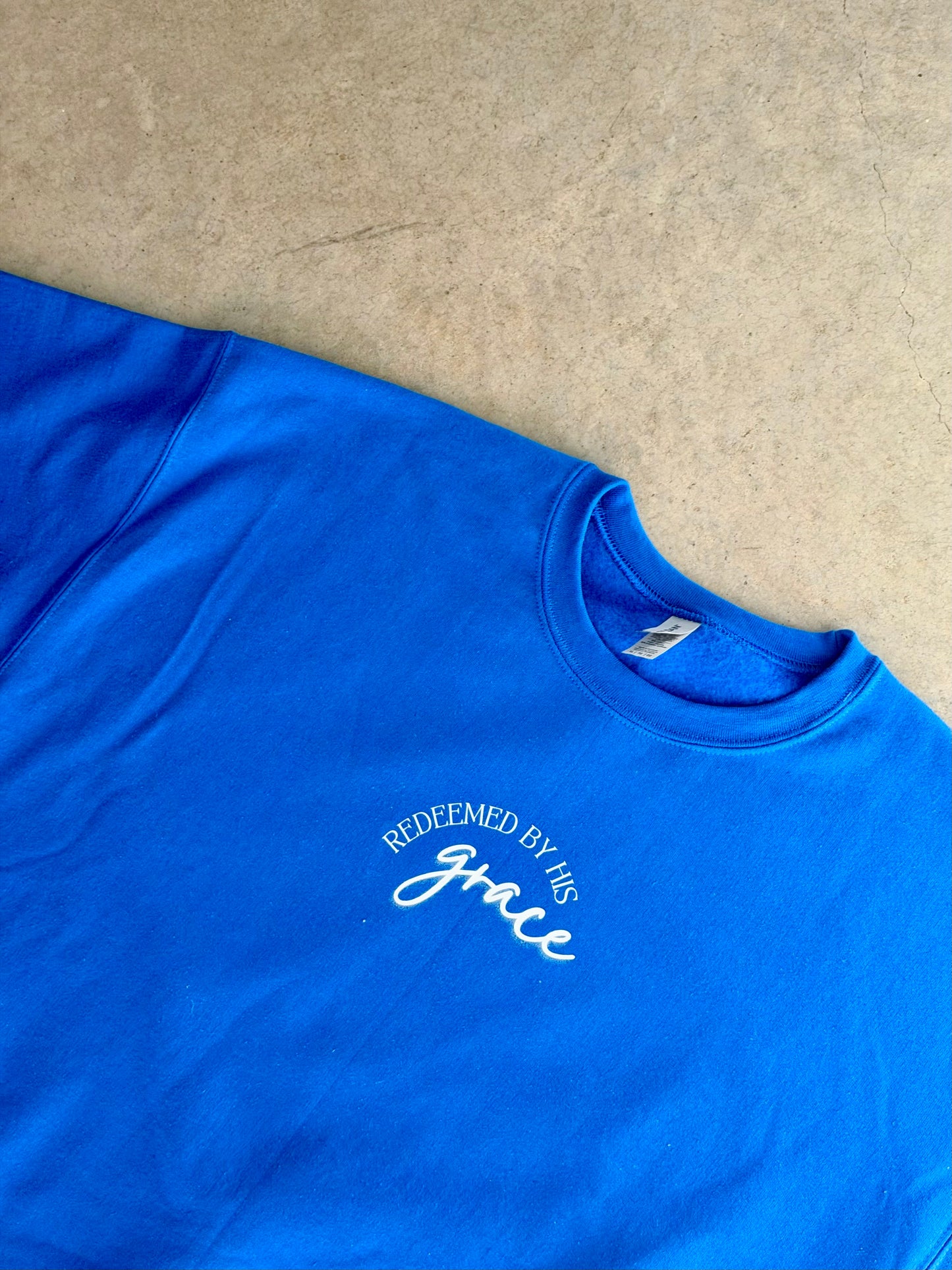 PRE-ORDER | REDEEMED BY HIS GRACE SWEATSHIRT